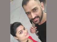 Photo Fan Chases Ms Dhoni Hummer On Her Scooty For Selfie