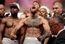Mcgregor Taunts Mayweather During Weigh In