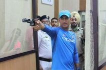 After Rain Dhoni Tries His Hand In Shooting