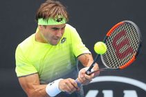 Ferrer Beaten In Montpellier Simon Edges Through