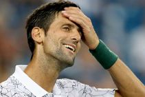 Djokovic Dimitrov Poised As Rain Wreaks Havoc Del Potro Through