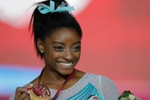 Biles Creates History Winning Four All Around World Titles