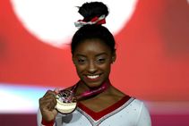 Simone Biles 13 Gold Medals World Championships Doha
