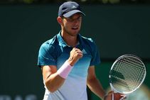 Thiem Overcomes Raonic To Set Up Federer Final