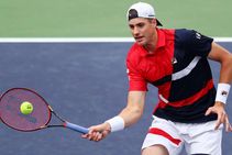 Miami Open Isner Djokovic Through As Thiem Nishikori Out