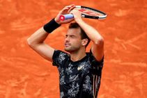 French Open Grigor Dimitrov Marin Cilic Stan Wawrinka Rescues Fan Rafael Nadal Roger Federer Through
