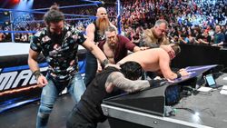 Roman Reigns The Miz Fended Off From Shane Mcmahon And Elias On Smackdown