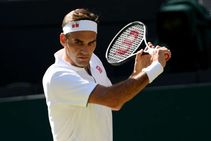 Wimbledon Federer Beats Briton Clarke In Straight Sets