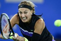 Kvitova Battles Through As Seeds Tumble In Wuhan