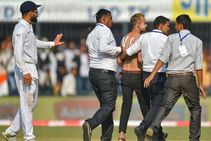 India Vs Bangladesh 1st Test Kohli Fan Sneaks Onto The Field During The First Test In Indore