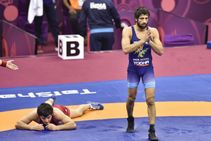 Asian Wrestling Ravi Dahiya Wins Gold Medal Bajrang Punia Settles For Silver