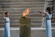 Japan Welcomes Olympic Flame As Doubts Swirl Over Games