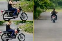 Ms Dhoni Rides A Bike At His Residence To Celebrate His Birthday Waves At Fans