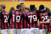 Milan 2 1 Genoa Own Goal Keeps Rossoneri In The Hunt