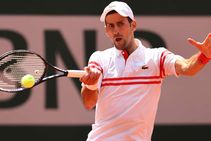 French Open Djokovic Roars Back To Reach Quarter Finals After Major Musetti Scare