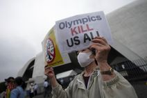 Tokyo 2020 Protesters Call For Cancellation Of Olympic Games
