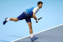 Atp Finals Djokovic Eases To Win In Opening Match Against Ruud