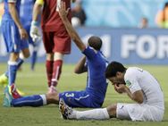 ಇಟಲಿಯ ಕೆಲ್ಲಿನಿ ಭುಜ ಕಚ್ಚಿದ ಉರುಗ್ವೆಯ ಸ್ವಾರೇಜ್