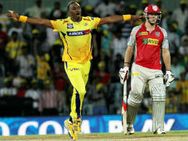 'பிளே ஆப்' சுற்றுக்கு சென்னை சூப்பர் கிங்ஸ் தகுதி- ஹஸ்சி, பிராவோ சாதனை