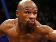 'விடாத குத்து' 50 போட்டிகளில் வென்று குத்துச் சண்டை மேவெதர் உலக சாதனை!