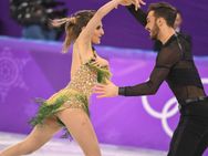 ஐஸ் நடனம் செய்யும் போதே பெண்ணின் மேலாடை அவிழ்ந்தது.. ஒலிம்பிக் போட்டியில் நடந்த ஹீரோயிசம்!