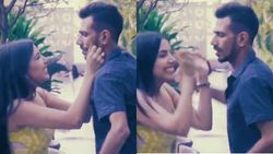 சஹல் கீழே குனிய.. செல்லமாக கன்னத்தைப் பிடித்து இழுத்து.. யாரும்மா.. என்ன விளையாட்டு இது!