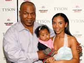Mike Tyson 'punches' photographer at LA airport