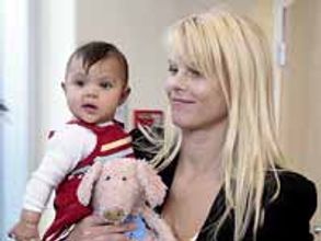 Woods' wife Elin ready to make the marriage work