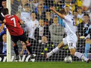 Arsenal avoid shock exit, United rout Leeds