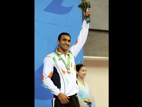 Asian Games: Sejwal bags swimming bronze for India; Saina Nehwal crashes out