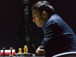 Magnus Carlsen takes safe route for a draw against Viswanathan Anand