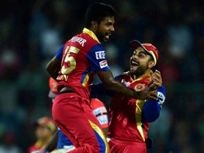 Starc and Gayle shine as Bangalore thrash Delhi by 10 wickets