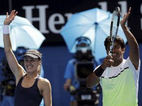 Wimbledon: Paes-Hingis pair enters semis; Bopanna-Mergea lose 5-set thriller