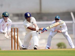 Rahul, Ojha hit half centuries against South Africa