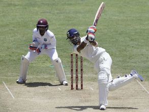 PHOTOS: Indian batsmen grind West Indies bowlers on Day 2