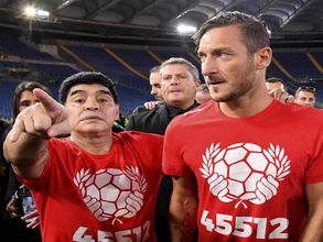 Diego Maradona leads current and former greats in match for peace