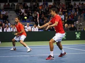 Davis Cup: Roundup - Serbia in last eight, Argentina stay alive