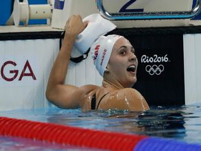 Swimming: Kylie Masse wins 100m backstroke world gold in record time
