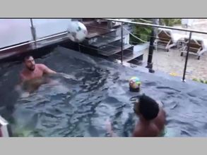 Video: Lionel Messi and Luis Suarez enjoy a game of football in pool