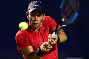 Coric stuns Isner, Bautista Agut eases through