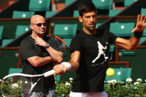 Agassi to stay on as Djokovic's coach