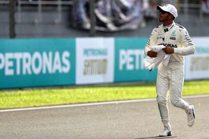 Hamilton delighted with 'surprise' pole as Vettel nightmare continues