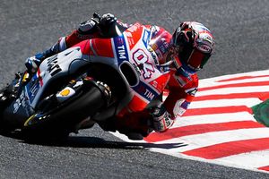 Dovizioso pips Marquez in wet practice at Motegi