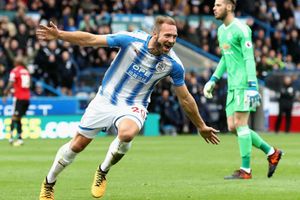 Huddersfield condemn Manchester United to first loss