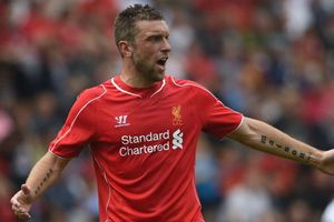 Former Liverpool and England striker Lambert retires