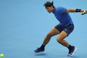 Nadal overcomes stern test from Isner in Beijing
