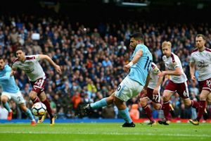 Aguero levels record as Man City stretch lead