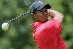 Tiger Woods hitting 'smooth iron shots' in injury update