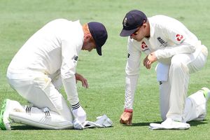 Bairstow hurt as Woakes shines for England