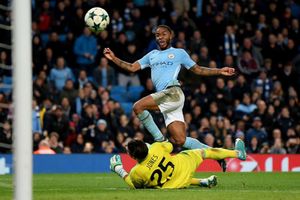 Manchester City 1 Feyenoord 0: Sterling strikes late as top spot is clinched